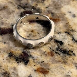 Lauren Adam’s white enamel ring and bracelet. Lots of detail and crystals.